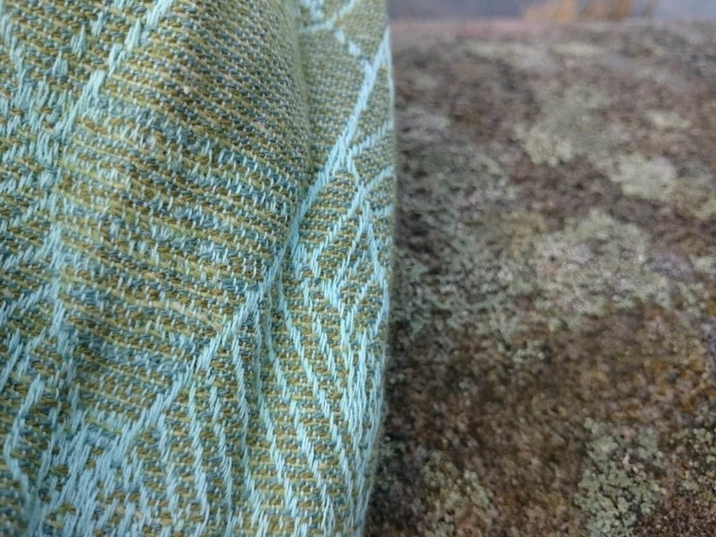 close up of Bracken Aqua Gossamer weft