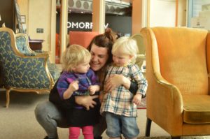 Jess from SUPU woven wraps having a cuddle in Ziferblat with her daughter and Nina, the youngest member of the Firespiral team!