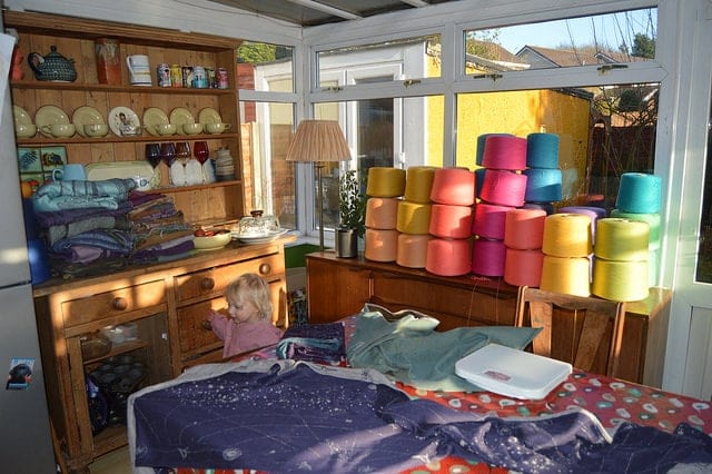 kitchen overrun with yarn cones