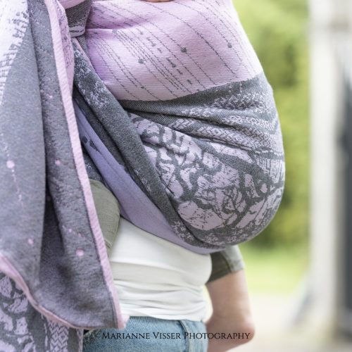 baby in pink lilac grey woven wrap sling