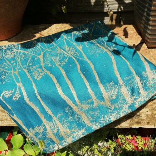 teal and gold scarf with tree design
