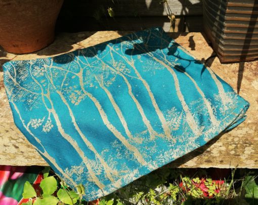 teal and gold scarf with tree design