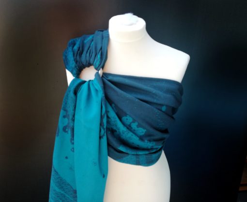 teal and navy ring sling with crashing waves design