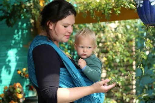 teal and turquoise woven warp worn in a front carry