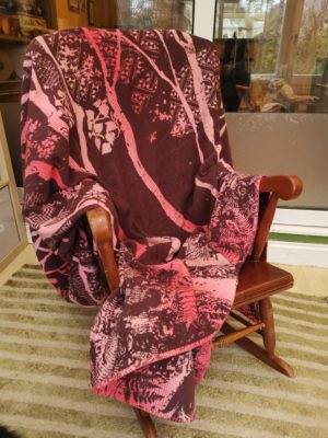 pink and burgundy birch forest patterned blanket