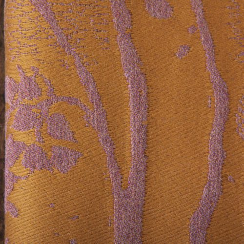 A woven wrap made from fluffy pink -grey merino wool and golden mustard cotton in a birch trees design