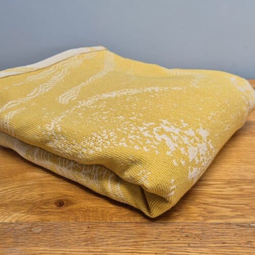 buttercup cirrus murmuration woven wrap